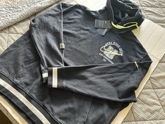 NIKE ATHLETIC DEPT SIZE 2XL STNDR FIT BLACK PULL OVER HOODIE.SEE DESCRIPTION