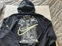 NIKE ATHLETIC DEPT SIZE 2XL STNDR FIT BLACK PULL OVER HOODIE.SEE DESCRIPTION