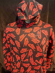Sz Teens Xl -Nike Sportswear Essential hoodie over red logo print on a black