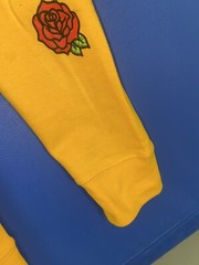 Lil TJay Rapper Yellow Hoodie “NONE OF YOUR LOVE” men’s Med Roses On Arms Nwot